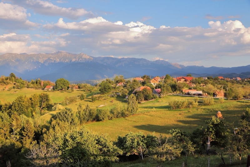 Summer evening over Măgura village and the Piatra Craiului mountains, Transylvania, Romania