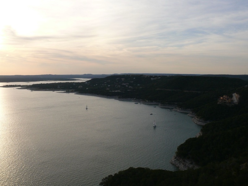 Sailboats on Lake Travis at dusk in the Texas Hill Country near Austin