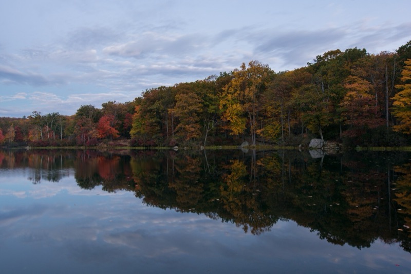 Autumn trees reflected in Lake Skannatati, Harriman State Park, New York